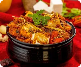 Rich Paneer Curry Served with Vegetables at an Indian Restaurant in Croydon