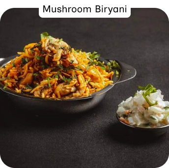 Flavourful Mushroom Biryani Served with Raita at a Top-Rated Indian Restaurant.