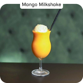 Fresh Mango Milkshake Served Chilled at an Indian Restaurant in Croydon